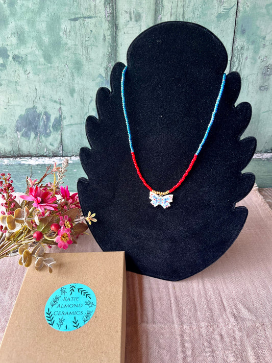 Porcelain beaded charm necklace