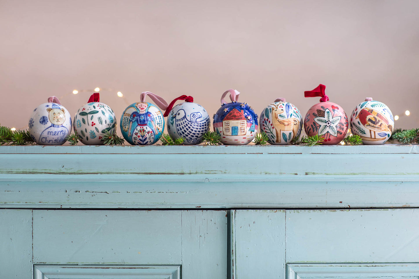 Festive hand-painted baubles