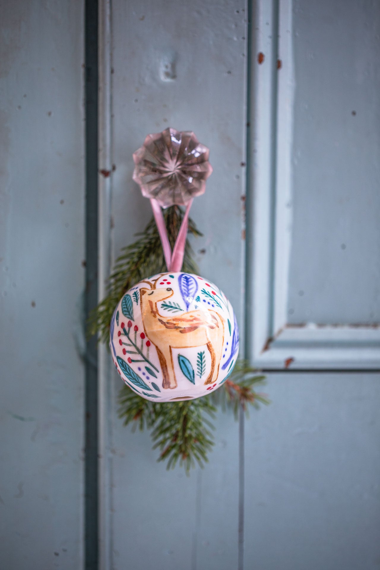 Festive hand-painted baubles
