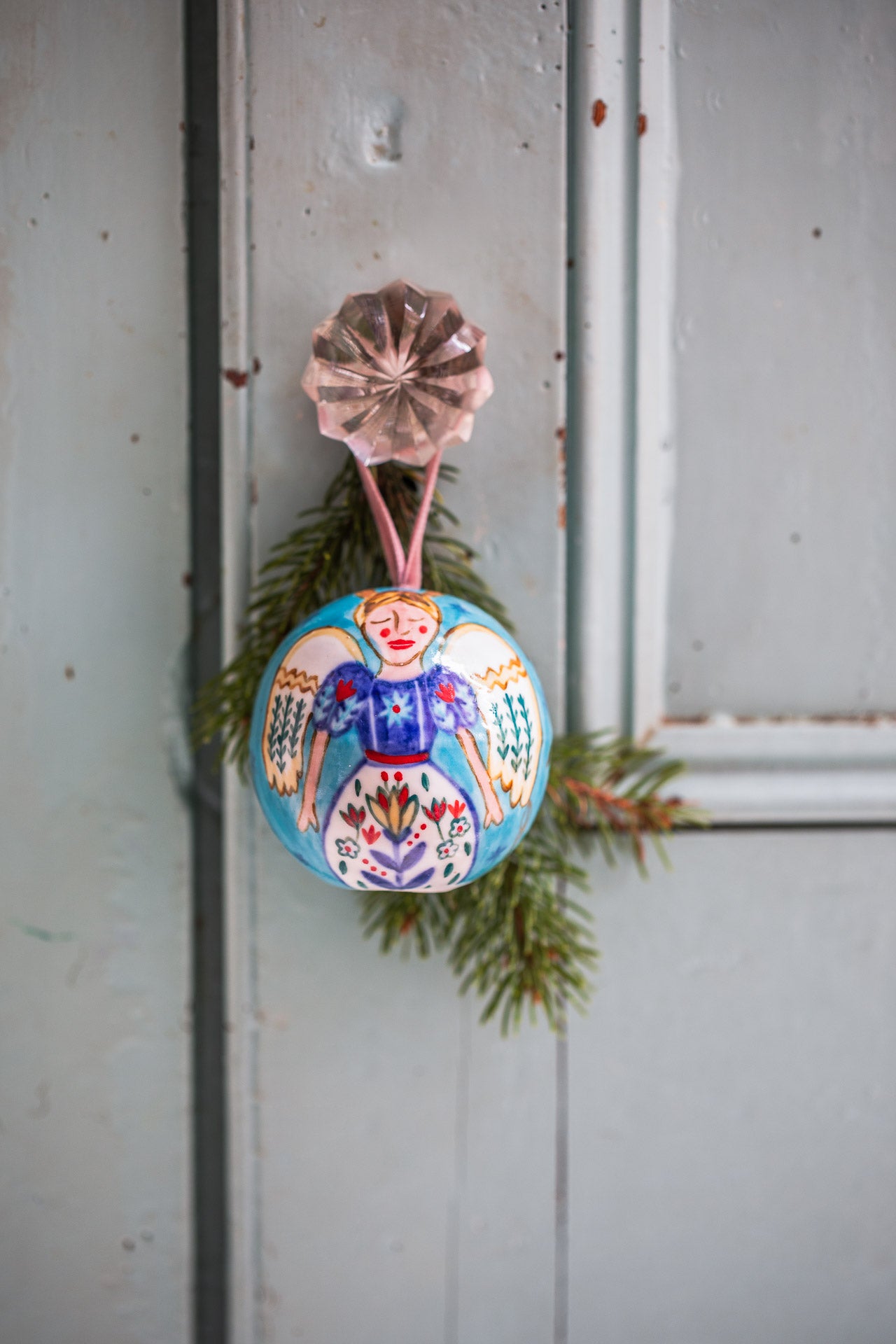Festive hand-painted baubles