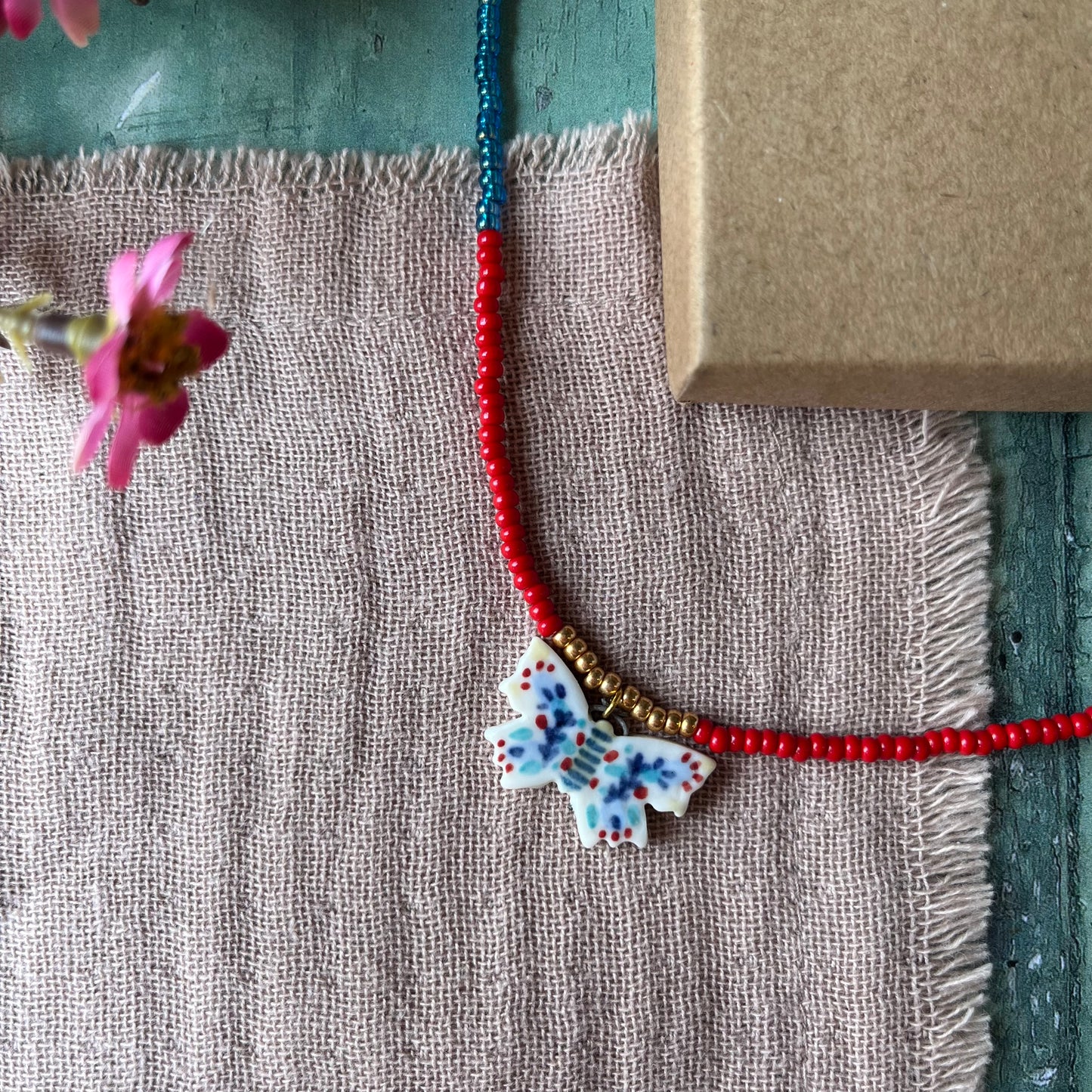 Porcelain beaded charm necklace