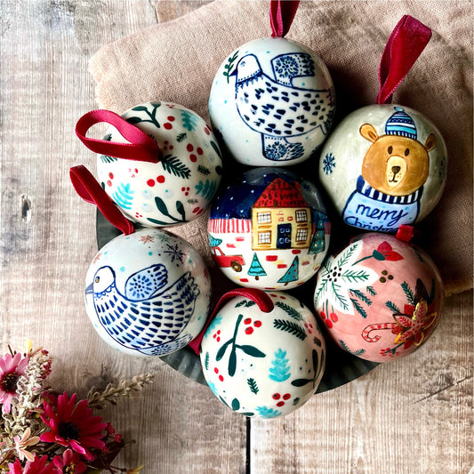 Festive hand-painted baubles